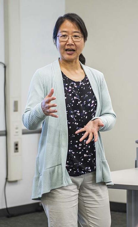 Professor Chao Chen teaching in a classroom